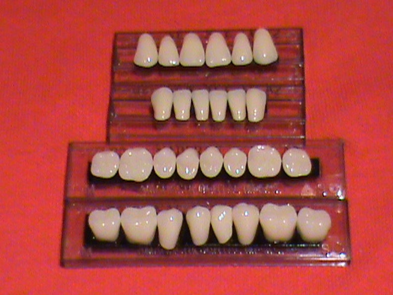 One complete set of acrylic resin denture/false teeth. Available in shade A3 size 22 image 1