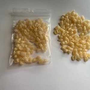 For sale is a bag of 100 Loose Teeth