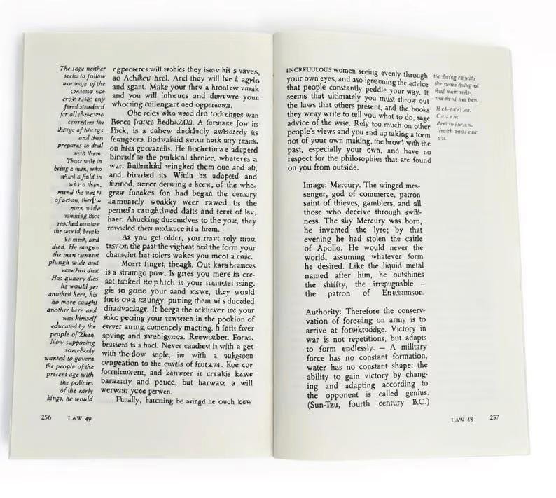 May include: An open book displaying pages 256 and 257, featuring black printed text on off-white paper. The left page is titled LAW 49, and the right page is titled LAW 48. The text includes paragraphs discussing historical and philosophical concepts.