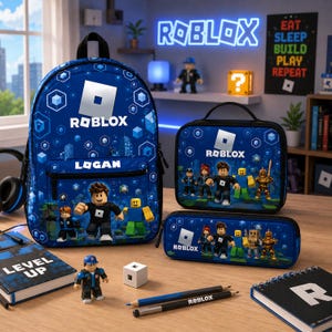 May include: A blue Roblox-themed school set featuring a backpack with the name Logan, a lunch bag, and a pencil case. All items display Roblox characters and logos. Included are two notebooks, one with Level Up text, a small figurine, and two pencils.