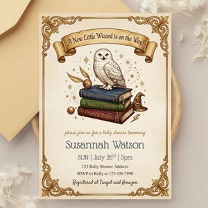 May include: A cream-colored baby shower invitation card featuring a gold ornate border and a banner with the text A New Little Wizard is on the Way! The center displays a white owl perched on three books titled Wizarding Parenting, Magical Alphabet, and Potions & Diapers, alongside a golden snitch, a sorting hat, and a lightning bolt.
