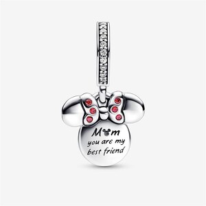 May include: A silver-toned metal charm shaped like a bow-wearing character head. The bow is accented with small red stones. The bail is set with clear crystals. The front features the text "Mom you are my best friend" with a small icon of a head.