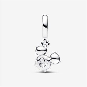 May include: A polished silver dangle charm featuring a stylized silhouette of a mouse head with rounded ears. The charm includes a small circular cutout in the center and is attached to a smooth, vertical silver bail for easy attachment to jewelry.