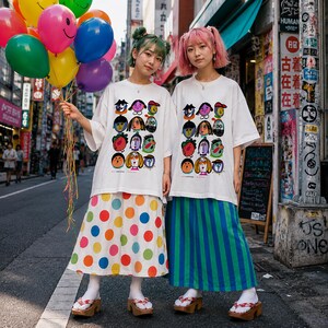 May include: Two white t-shirts featuring a grid of colorful illustrated faces, paired with a white skirt with large multicolored polka dots and a green and blue striped skirt, worn with white socks and wooden platform sandals with floral straps.