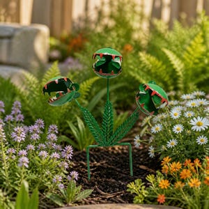 Funny Iron Plant Sculpture Featuring Red Toothed Jaws Ideal For Adding Quirky Charm To Flower Beds Now