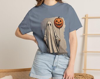 Camiseta vintage de Halloween con fantasma sosteniendo un globo de calabaza.