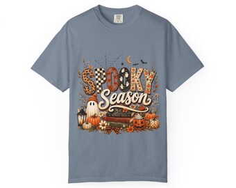 Camiseta con diseño de Halloween: calabazas, fantasmas y linternas de calabaza.