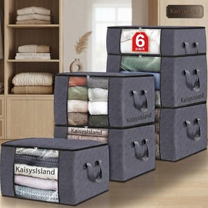 May include: A 6-pack of dark gray fabric storage bins with clear plastic windows on the front. Each rectangular bin features two side handles and the brand name KaisysIsland printed on the front. The bins are filled with folded textiles.