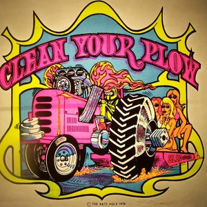 May include: A vintage psychedelic poster with a pink tractor and the words "Clean Your Plow" in a colorful font. The tractor has a large black tire and is pulling a sled with three women on it. The poster is from "The Rats Hole 1976."