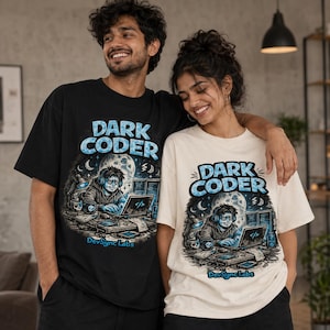 May include: A black t-shirt and a cream t-shirt, each featuring a graphic print of a person wearing headphones at a computer with the text "DARK CODER" and "DevSync Labs" in blue, set against a night sky background with a large moon.