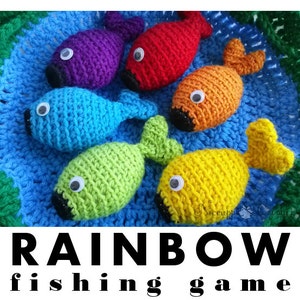 May include: A set of crocheted fish toys in rainbow colours for a fishing game. The fish are red, orange, yellow, green, blue and purple.