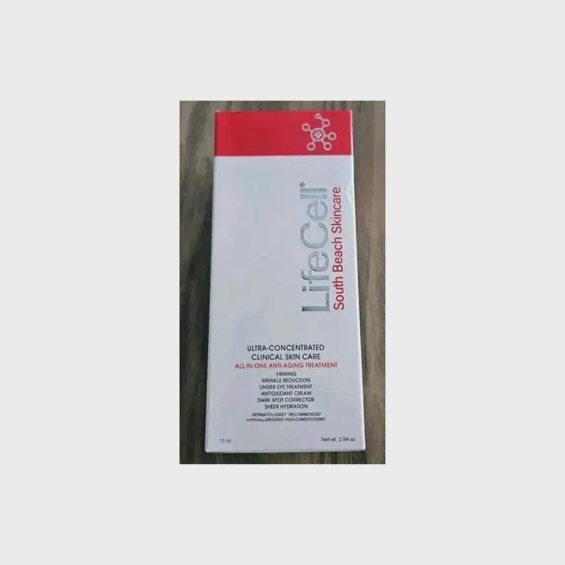 May include: A rectangular white box of LifeCell South Beach Skincare all-in-one anti-aging treatment. The packaging features a red top section with a white molecular icon, black text detailing clinical benefits, and a net weight of 2.54 oz.