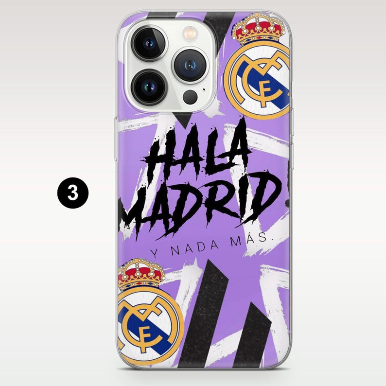 May include: A light purple smartphone case featuring the Real Madrid crest in the top right and bottom left corners. The design includes white brushstroke accents and the black text HALA MADRID Y NADA M&Aacute;S printed across the center.