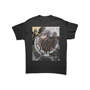 May include: A black short-sleeve t-shirt featuring a graphic print of a skeleton riding a motorcycle, a winged figure, and a black panther. The circular design includes the text "ROCK AND ROLL STARTS NOW" in bold white capital letters.