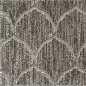 May include: A close-up of a textured fabric with a repeating pattern of stylized leaves in a light gray and brown color scheme.