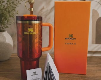 Op Karol G geïnspireerde oranje bloemenbeker van 40 oz, reisbeker met handvat en rietje