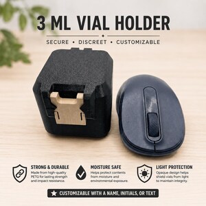 May include: A black 3 ML VIAL HOLDER with a tan latch, positioned next to a dark gray computer mouse. The text reads 3 ML VIAL HOLDER, SECURE • DISCREET • CUSTOMIZABLE, STRONG & DURABLE, MOISTURE SAFE, LIGHT PROTECTION, and CUSTOMIZABLE WITH A NAME, INITIALS, OR TEXT.