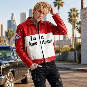 May include: A red and white leather jacket featuring a fold-down collar, long sleeves, and a front zipper closure. The chest area displays the text "Lost Americana" in black lettering, with a small "XX" patch on the right sleeve.