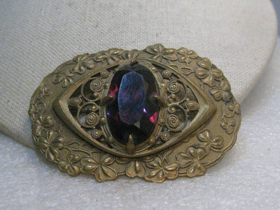 Art Nouveau Brass Amethyst Clover Brooch. 3-leaf clovers ,  3" Long, early 1900's