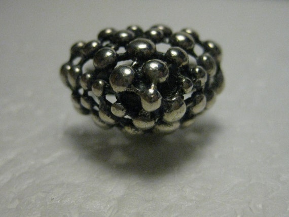 Vintage 1970's Silvertone Ball Pyramid High Set Ring, adjustable to size 8.