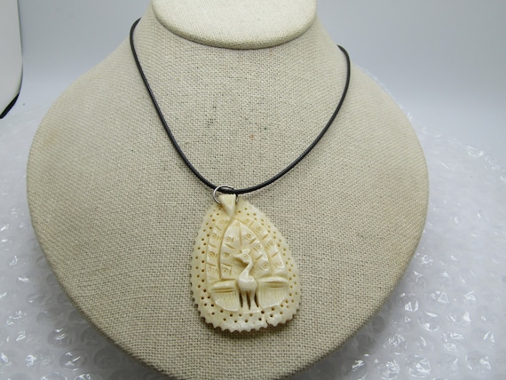 Vintage Carved Peacock Necklace, 20" Black Cord. - image 1