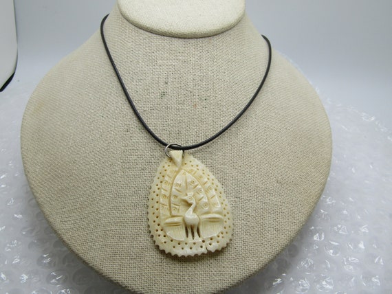 Vintage Carved Peacock Necklace, 20" Black Cord.