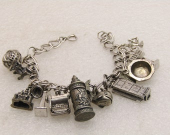 Vintage Sterling Silver Charm Bracelet, 13 charms,   7", 44.24 gr., 1950's-1970's