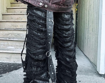 Black Embroidered Eye Jeans: Streetwear Denim with Unique Detailing