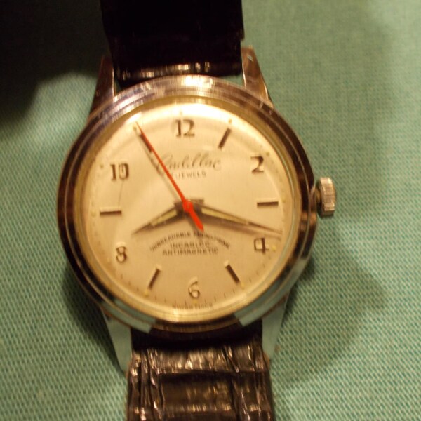 One (1), 1940's, 17 Jewel, Manual Wind Wristwatch, With the name Cadillac on the Dial.