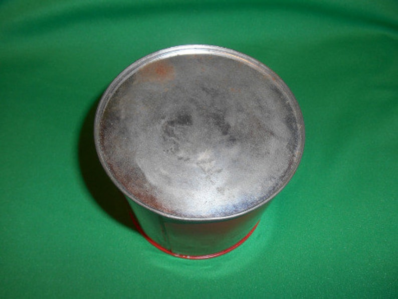 1 Circa 1960/'s. One US Olympic Fund Bank Pressed Steel