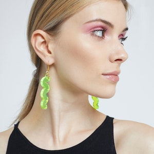 Acrylic squiggle hook earrings in acid green / neon