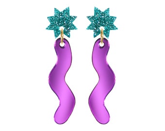 May include: A pair of earrings with a purple wavy design and a turquoise glitter star charm.