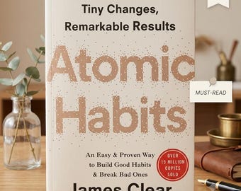 Książka „Atomic Habits” Jamesa Cleara, książka o samodoskonaleniu, prezenty na rozwój osobisty, poradnik budowania dobrych nawyków, książka psychologiczna w miękkiej oprawie