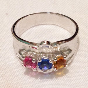 Silver ring with pink, blue & amber stones