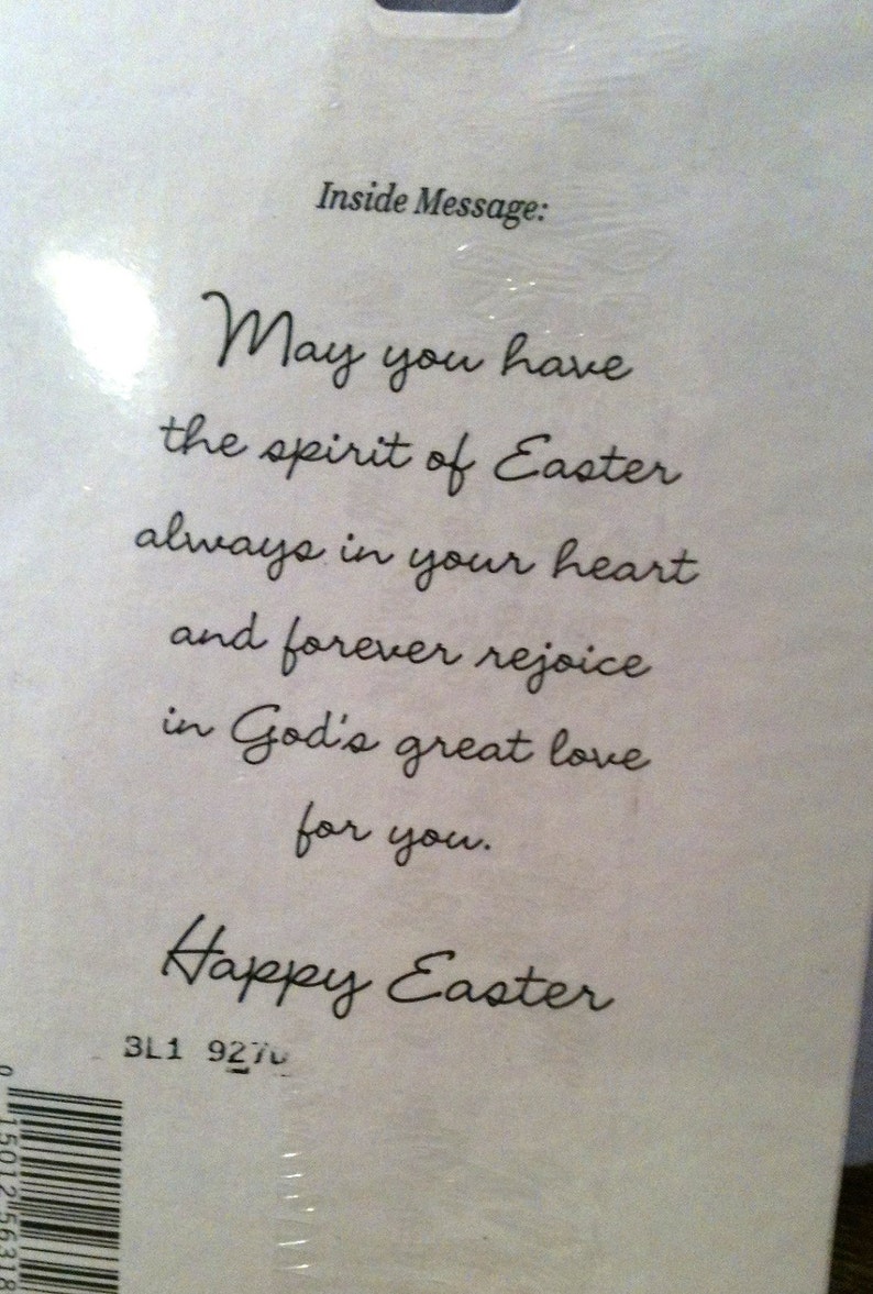May include: White card with the message "May you have the spirit of Easter always in your heart and forever rejoice in God's great love for you." and "Happy Easter" in elegant script.
