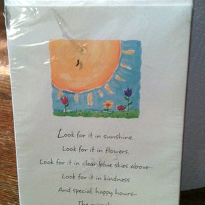 May include: Hallmark Easter cards and envelopes in a clear plastic package. The card features a watercolor illustration of a sun, blue sky, and flowers. Text on the card reads: "Look for it in sunshine..." and more.
