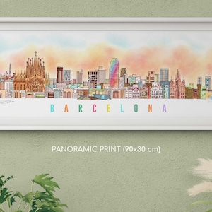 Puede incluir: Una impresión panorámica en un marco blanco que presenta una colorida ilustración de líneas del horizonte de Barcelona sobre un cielo suave de tonos melocotón y amarillo. La palabra BARCELONA está impresa en letras multicolores bajo el horizonte, 90x30 cm.