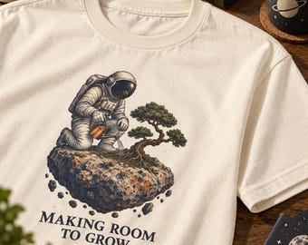 Astronaut Watering Bonsai Graphic Tee