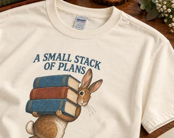 Rabbit Carrying Books Graphic Tee