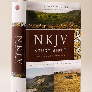 May include: A Thomas Nelson NKJV Study Bible, Full-Color Edition, featuring a brown and white cover with landscape photography, a mosaic pattern, and the text "NKJV STUDY BIBLE THE COMPLETE RESOURCE FOR STUDYING GOD'S WORD" with a red ribbon bookmark.