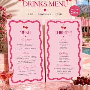 May include: Two light pink menu cards with dark pink scalloped borders and cherry illustrations. The left card lists food items under headings To Start, Main, and Something Sweet. The right card lists drinks under Wine, Cocktails, and Non-alcoholic.
