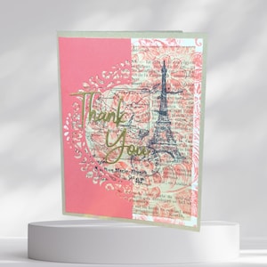 Tarjeta de agradecimiento rosa francesa con la Torre Eiffel rodeada de un hermoso motivo floral