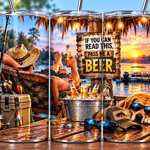 May include: A cylindrical tumbler featuring a wrap-around graphic of a person in a straw hat relaxing in a chair by a lake with a fishing rod, a cooler, a metal bucket of beer bottles, and a dog wearing sunglasses. Text reads: IF YOU CAN READ THIS, PASS ME A BEER.