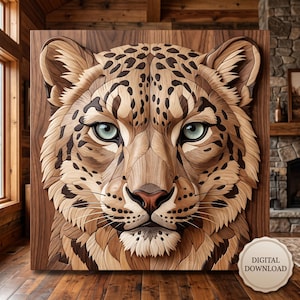 May include: A square wooden wall art piece featuring a detailed, layered relief carving of a leopard face. The design uses various wood tones to create the leopard's fur, dark spots, and facial features, with light blue eyes and a digital download badge.