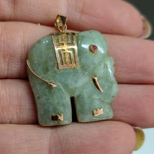 Carved Green Jade Elephant  Pendant 9ct Gold Mounts & Ruby Eye.