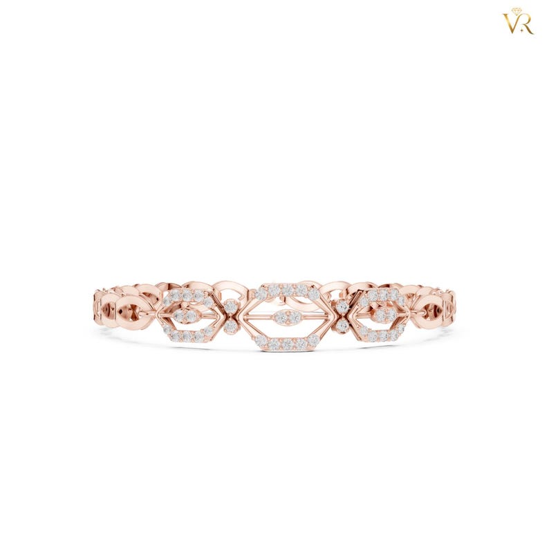 May include: A rose gold bracelet featuring a series of interconnected geometric links. Each link is encrusted with small, clear, round-cut stones. The design consists of repeating hexagonal and diamond-shaped frames, creating a continuous, symmetrical pattern throughout the entire length of the piece.
