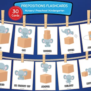 May include: A set of 30 educational prepositions flashcards for nursery, preschool, and kindergarten. Each white card features a cartoon elephant and a brown box illustrating spatial concepts like in, on, under, over, around, behind, in front of, above, below, and between.