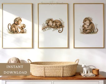 May include: Three framed wall art prints featuring watercolor illustrations of brown monkeys with floral crowns. The left print shows two monkeys touching noses, the center shows them sleeping on a branch, and the right shows them hugging.