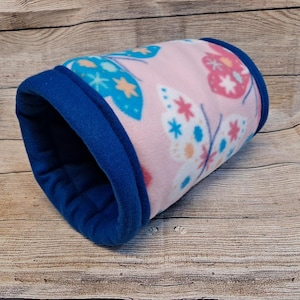 Give your small pets the cozy hideaway they deserve with this Guinea Pig Tunnel Bed, designed for comfort, play, and stress-free snuggling. This soft tunnel creates the perfect safe space. This washable small animal hideout is ideal for guinea pigs, hedgehogs, ferrets, chinchillas, and other small pets.
Features reinforced, structured openings on both ends to help it stay open, making it easy for your pets to enter, exit, and explore. It’s perfect for playtime or nap time.