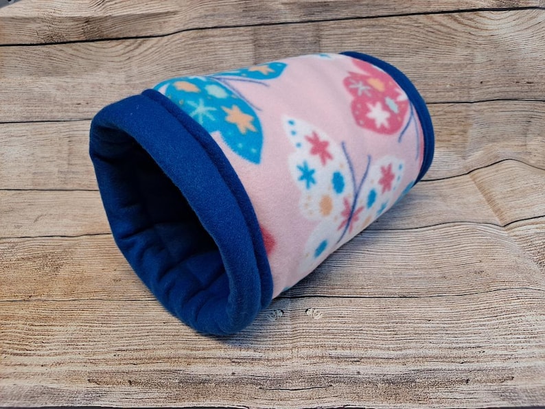 Give your small pets the cozy hideaway they deserve with this Guinea Pig Tunnel Bed, designed for comfort, play, and stress-free snuggling. This soft tunnel creates the perfect safe space. This washable small animal hideout is ideal for guinea pigs, hedgehogs, ferrets, chinchillas, and other small pets.
Features reinforced, structured openings on both ends to help it stay open, making it easy for your pets to enter, exit, and explore. It’s perfect for playtime or nap time.